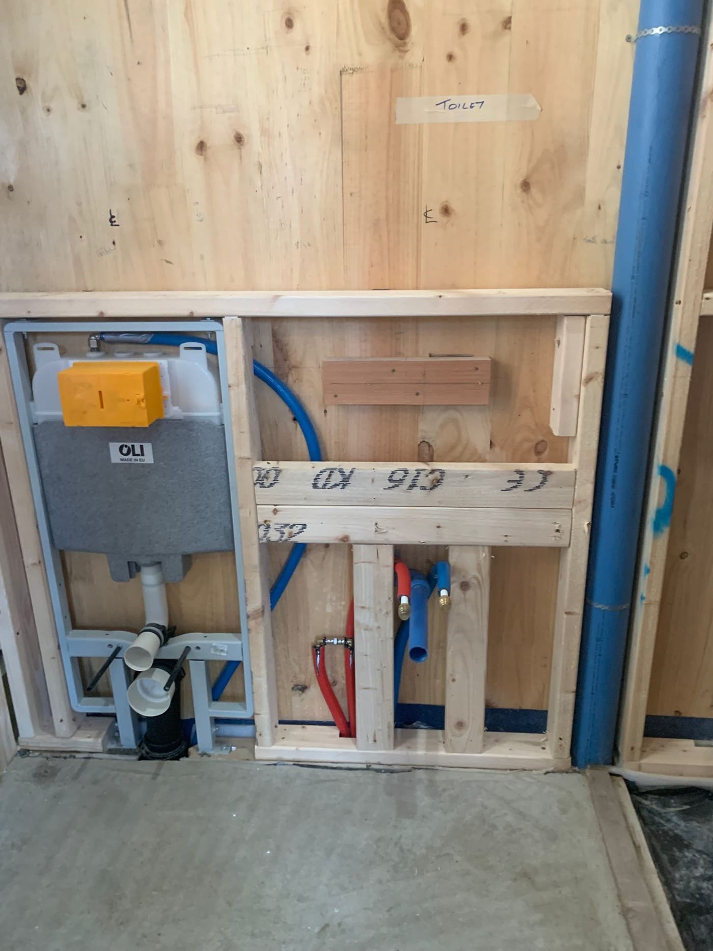 Bathroom first-fix: concealed cistern frame and hot and cold pipework in Dublin
