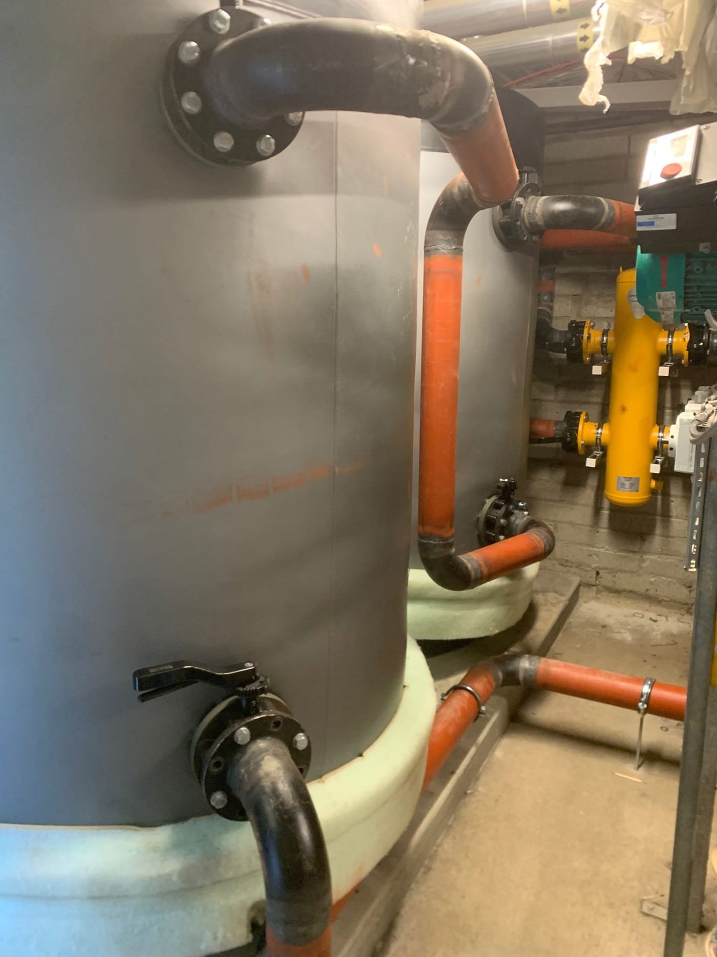Commercial heating plant with buffer tanks and pumps serviced in Dublin