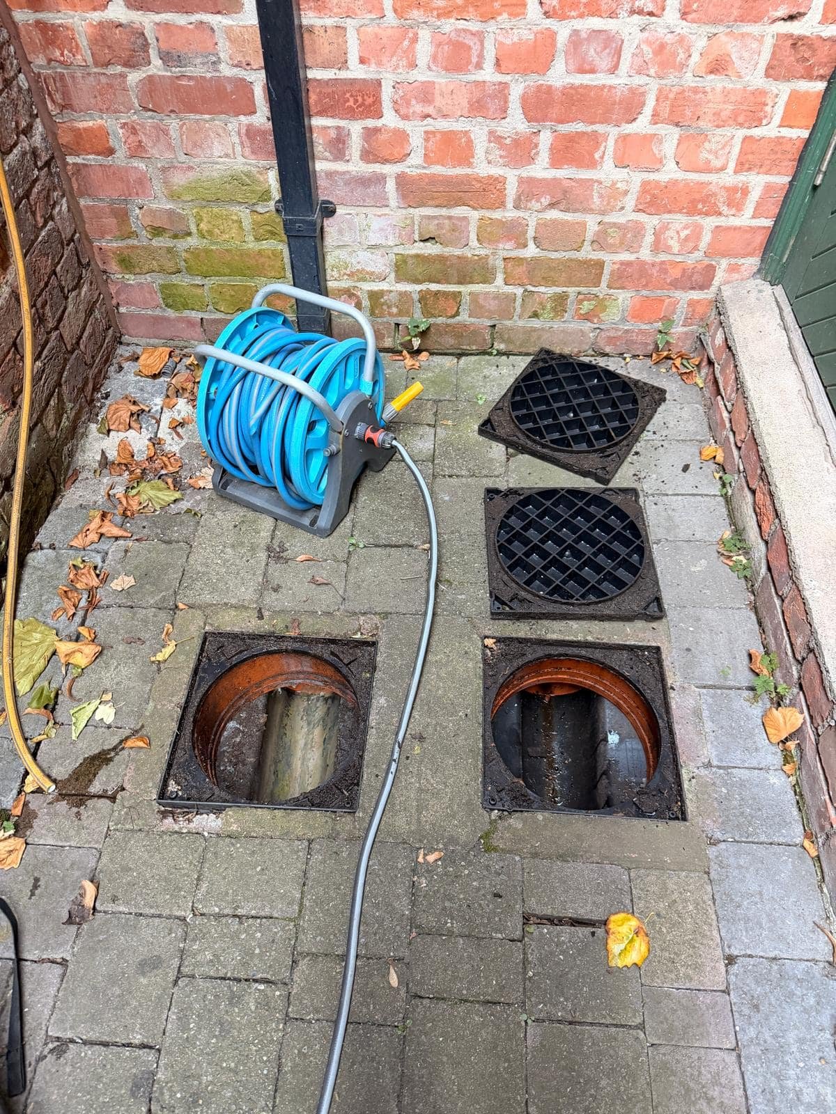 Inspection chambers opened, drains running clear after jetting in Dublin