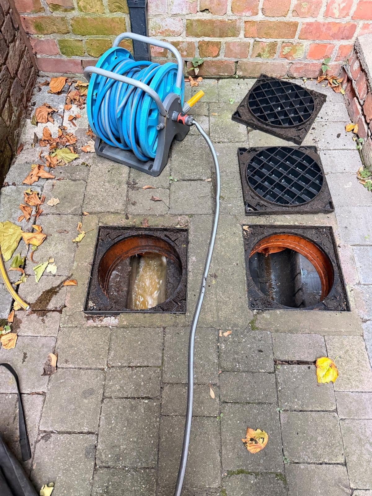 High-pressure jetting flushing a blocked external drain in Dublin
